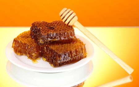 Honeycomb on orange backgroundの写真素材