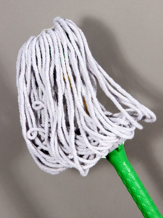 Mop for floor on gray backgroundの写真素材