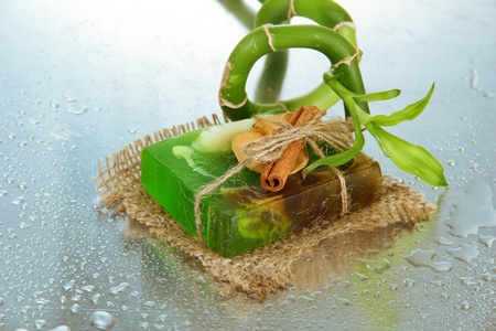 Hand-made soap and bamboo with drops, close upの写真素材
