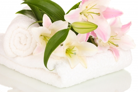 beautiful lily on towel isolated on whiteの写真素材