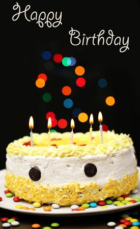 Happy birthday cake, on black backgroundの写真素材