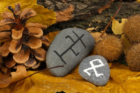 Fortune telling  with symbols on stones close upの写真素材