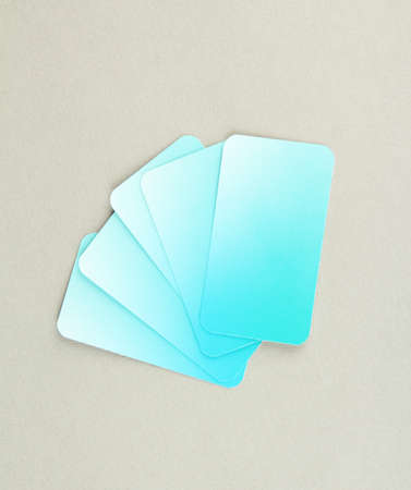 Business cards on color background