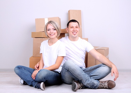 Young couple moving in new house