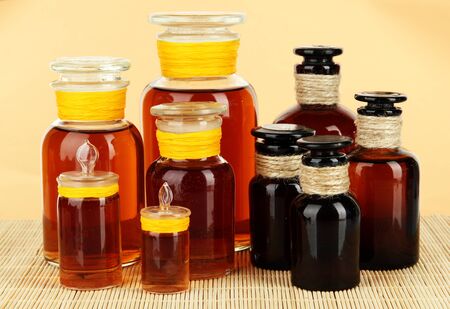 Medicine bottles on beige backgroundの写真素材
