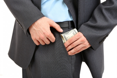 Young businessman with money isolated on white
の写真素材