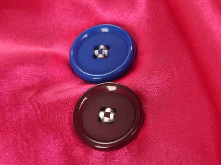 Two buttons on pink background