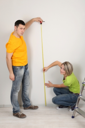 Young couple moving in new houseの写真素材