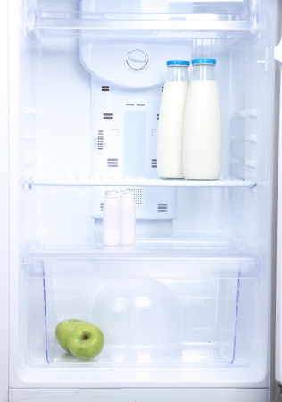 Open refrigerator with diet foodの写真素材