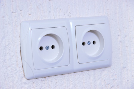 Two sockets  on wall