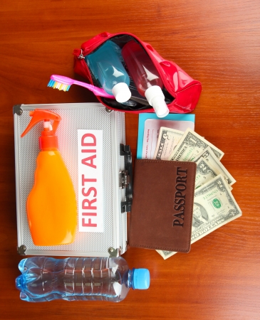 Travelling items on wooden backgroundの写真素材