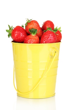 Fresh strawberry in pail isolated on whiteの写真素材