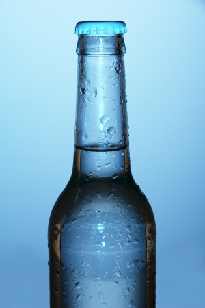Water bottle on blue backgroundの写真素材