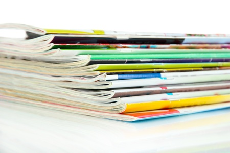 Many magazines isolated on whiteの写真素材