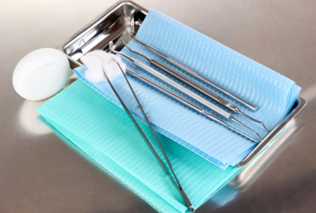 Dentist tools on grey table close-upの写真素材