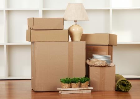 Moving boxes in empty room Moving boxes in empty room