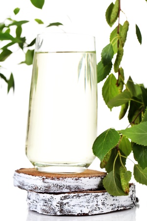 Glass of birch sap, isolated on whiteの写真素材