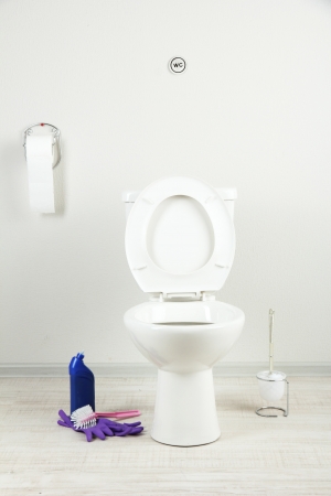 White toilet bowl and  cleaner bottle in a bathroomの写真素材