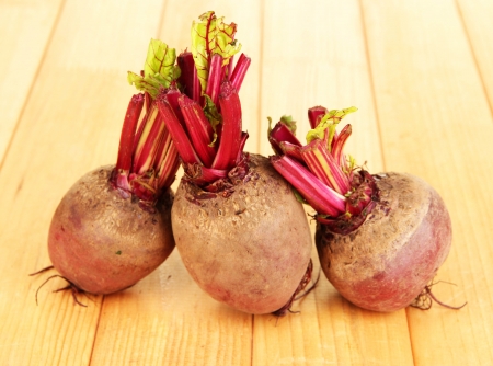 Young beets on wooden table close-upの写真素材