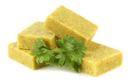 Bouillon cubes with parsley, isolated on whiteの写真素材