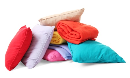 Bright pillows and plaids, isolated on whiteの写真素材
