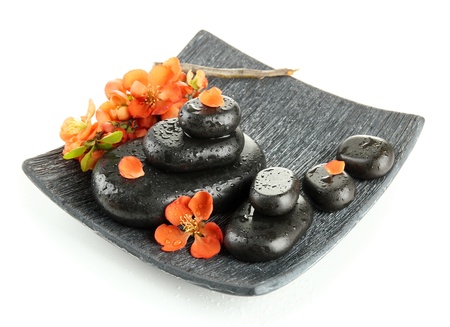 Spa stones and flowers isolated on whiteの写真素材