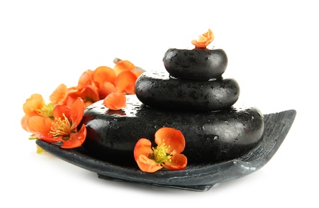 Spa stones and flowers isolated on whiteの写真素材