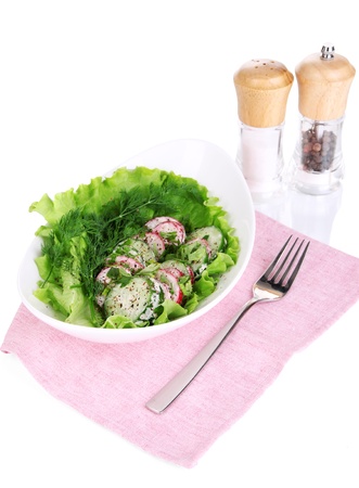Vitamin vegetable salad in plate isolated on whiteの写真素材