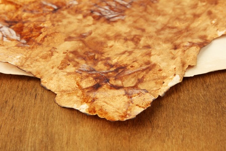 Old papers on wooden backgroundの写真素材