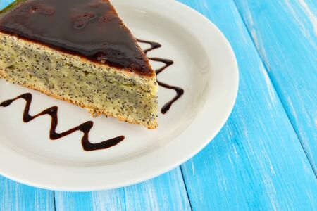 Delicious poppy seed cake on table close-upの写真素材