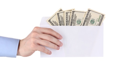 man's hand holding an envelope with dollars on white backgroundの写真素材