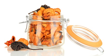 Assorted dried fruits in bank isolated on whiteの写真素材