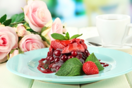Tasty jelly dessert with fresh berries, on bright backgroundの写真素材