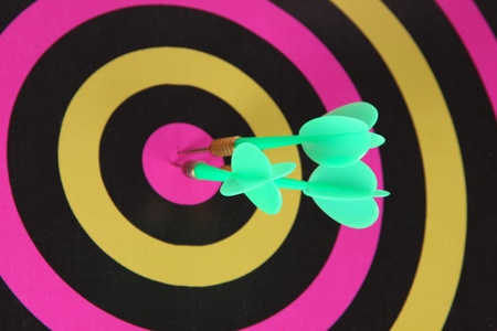 Target with darts close-up