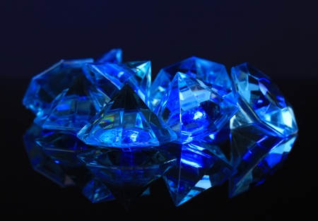 Diamonds on dark color backgroundの写真素材