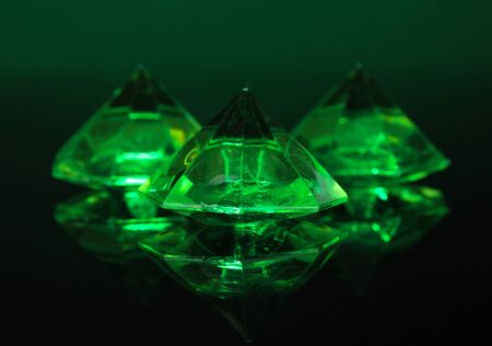 Diamonds on dark color backgroundの写真素材