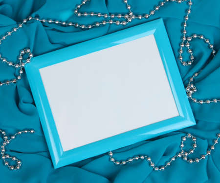 Empty frame on beautiful silk backgroundの写真素材