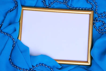 Empty frame on beautiful silk backgroundの写真素材