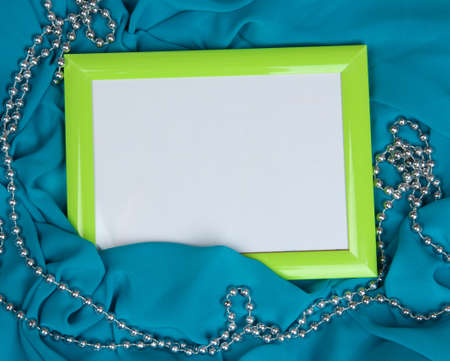 Empty frame on beautiful silk backgroundの写真素材
