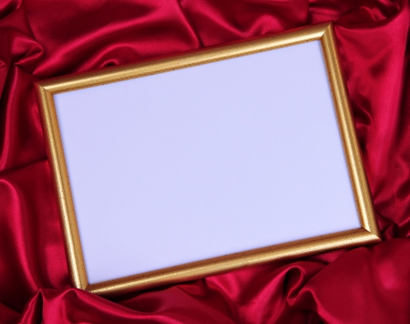 Empty frame on beautiful silk backgroundの写真素材