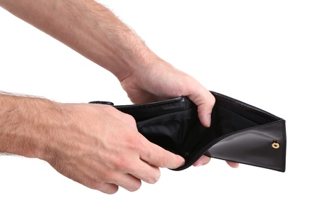 Man showing his empty purse, isolated on white