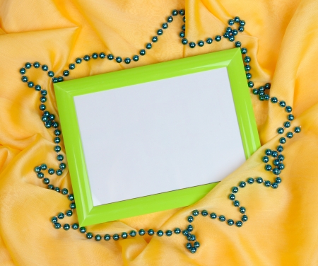 Empty frame on beautiful silk backgroundの写真素材