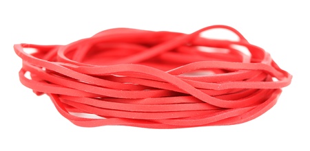 Red rubber bands isolated on whiteの写真素材