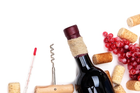 Bottle of wine, grapes and corks, isolated on whiteの写真素材