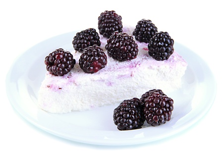 Cheesecake with fresh berries on white plate closeupの写真素材
