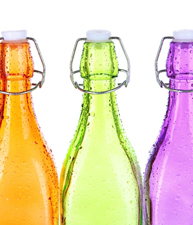 Colorful bottles isolated on whiteの写真素材
