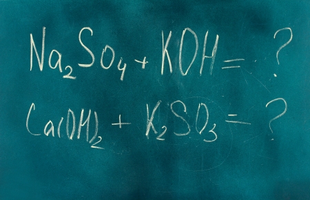 Chemical formula written on blackboard with chalk.の写真素材