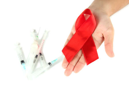 AIDS ribbon in hands isolated on white