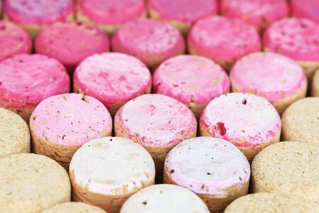 Pink wine corks close-up background
