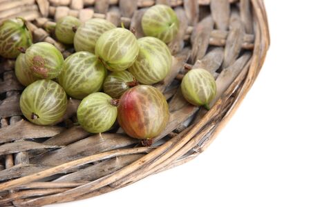 Ripe gooseberry isolated on whiteの写真素材